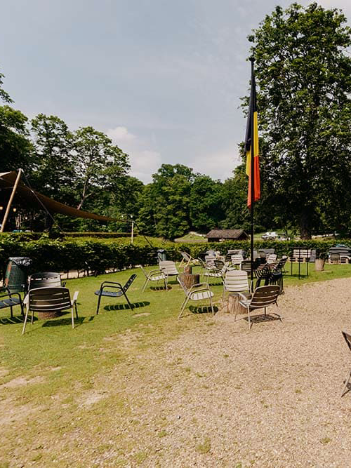 Chalet-Robinson-Outside-Belgian-Flag.png
